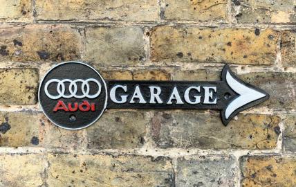 Audi garage arrow sign-white